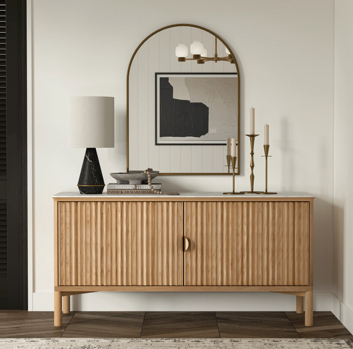 Wooden sideboard with decorative items in a room setting